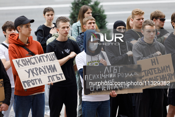 Demonstrators are holding a protest action outside the Kyiv City State Administration against the LGBT community to call for the cancellatio...