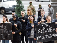 Demonstrators are holding a protest action outside the Kyiv City State Administration against the LGBT community to call for the cancellatio...