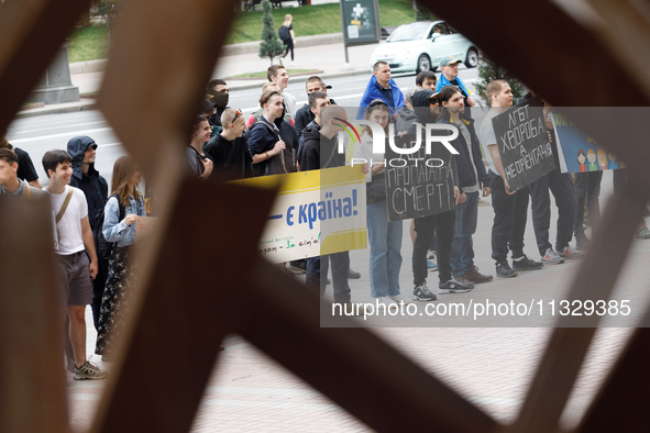 Demonstrators are holding a protest action outside the Kyiv City State Administration against the LGBT community to call for the cancellatio...