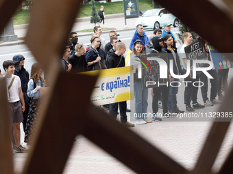 Demonstrators are holding a protest action outside the Kyiv City State Administration against the LGBT community to call for the cancellatio...