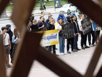 Demonstrators are holding a protest action outside the Kyiv City State Administration against the LGBT community to call for the cancellatio...