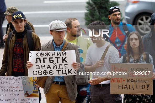 Demonstrators are holding a protest action outside the Kyiv City State Administration against the LGBT community to call for the cancellatio...