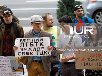 Demonstrators are holding a protest action outside the Kyiv City State Administration against the LGBT community to call for the cancellatio...