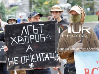 Demonstrators are holding a protest action outside the Kyiv City State Administration against the LGBT community to call for the cancellatio...