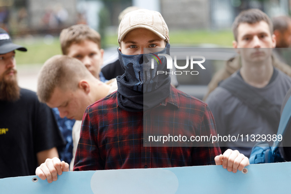 Demonstrators are holding a protest action outside the Kyiv City State Administration against the LGBT community to call for the cancellatio...