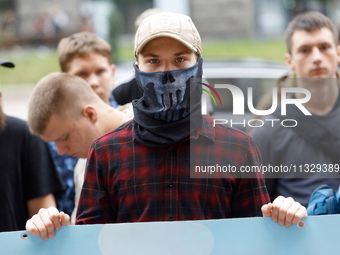 Demonstrators are holding a protest action outside the Kyiv City State Administration against the LGBT community to call for the cancellatio...