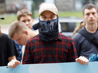 Demonstrators are holding a protest action outside the Kyiv City State Administration against the LGBT community to call for the cancellatio...