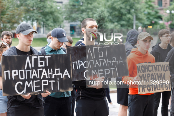 Demonstrators are holding a protest action outside the Kyiv City State Administration against the LGBT community to call for the cancellatio...