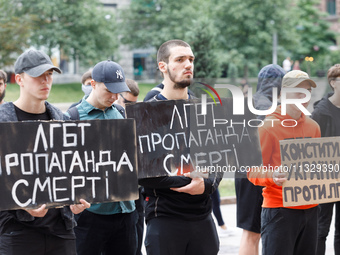 Demonstrators are holding a protest action outside the Kyiv City State Administration against the LGBT community to call for the cancellatio...