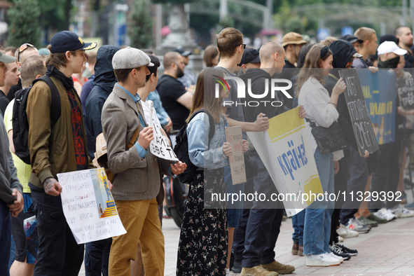 Demonstrators are holding a protest action outside the Kyiv City State Administration against the LGBT community to call for the cancellatio...