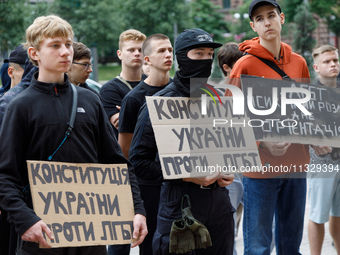 Demonstrators are holding a protest action outside the Kyiv City State Administration against the LGBT community to call for the cancellatio...