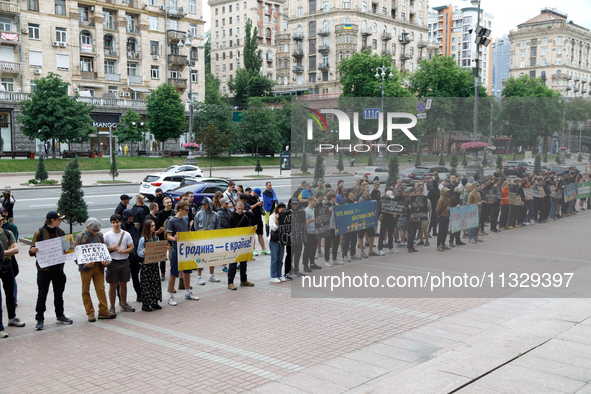 Demonstrators are holding a protest action outside the Kyiv City State Administration against the LGBT community to call for the cancellatio...