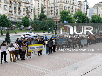 Demonstrators are holding a protest action outside the Kyiv City State Administration against the LGBT community to call for the cancellatio...