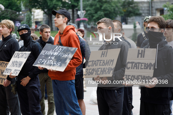 Demonstrators are holding a protest action outside the Kyiv City State Administration against the LGBT community to call for the cancellatio...