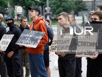 Demonstrators are holding a protest action outside the Kyiv City State Administration against the LGBT community to call for the cancellatio...