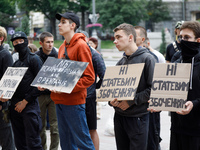 Demonstrators are holding a protest action outside the Kyiv City State Administration against the LGBT community to call for the cancellatio...