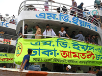 Passengers are gathering at the launch terminal for ferries as they are traveling back to their villages from the capital Dhaka to celebrate...