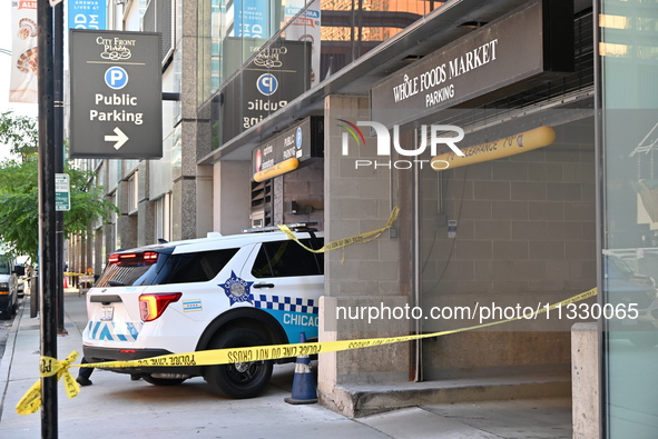 Chicago police are staging at the Whole Foods Market parking garage. A 50-year-old male victim is wounded in a shooting outside of Whole Foo...