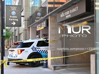 Chicago police are staging at the Whole Foods Market parking garage. A 50-year-old male victim is wounded in a shooting outside of Whole Foo...