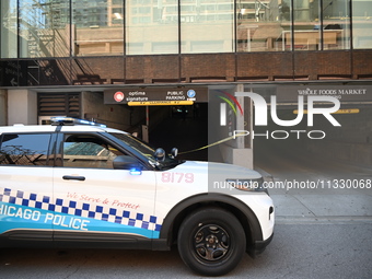 Chicago police are staging at the Whole Foods Market parking garage. A 50-year-old male victim is wounded in a shooting outside of Whole Foo...