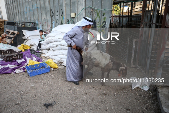 Khadir Al-Saidi, A Palestinian, Sells Livestock At His Farm In The Town Of At-Tur On Friday, June 14,2024 In East Jerusalem. Meanwhile, Musl...