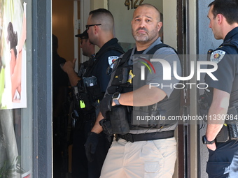 Police officers and federal agents are converging on Oakton Spa to execute a search warrant. Homeland Security Investigations Agents and Sko...