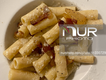 A dish of Gricia pasta is being seen in a restaurant in Rome, Italy, on June 14, 2024 (