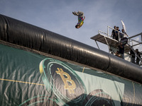 A young Iranian diver is jumping during a street diving event organized and held by Tehran's Adrenaline Park, in a recreation area in wester...