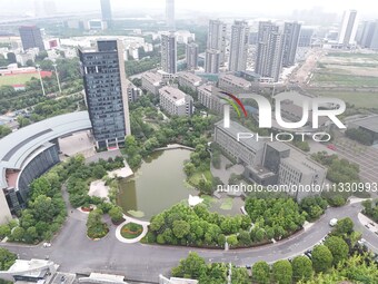 A lake shaped like a map of China is being seen at a university in Hangzhou, Zhejiang province, China, on June 14, 2024. (