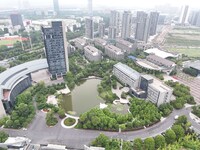 A lake shaped like a map of China is being seen at a university in Hangzhou, Zhejiang province, China, on June 14, 2024. (