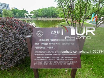 A lake shaped like a map of China is being seen at a university in Hangzhou, Zhejiang province, China, on June 14, 2024. (