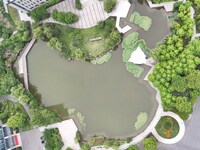 A lake shaped like a map of China is being seen at a university in Hangzhou, Zhejiang province, China, on June 14, 2024. (