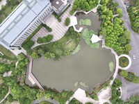 A lake shaped like a map of China is being seen at a university in Hangzhou, Zhejiang province, China, on June 14, 2024. (