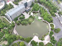 A lake shaped like a map of China is being seen at a university in Hangzhou, Zhejiang province, China, on June 14, 2024. (