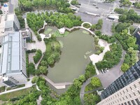 A lake shaped like a map of China is being seen at a university in Hangzhou, Zhejiang province, China, on June 14, 2024. (