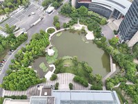 A lake shaped like a map of China is being seen at a university in Hangzhou, Zhejiang province, China, on June 14, 2024. (