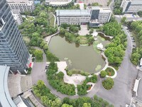 A lake shaped like a map of China is being seen at a university in Hangzhou, Zhejiang province, China, on June 14, 2024. (