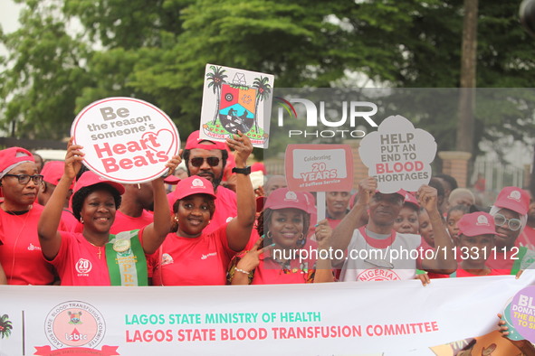 Members of the Lagos State Blood Transfusion Committee and others are participating in the committee's awareness walk to mark 2024 World Blo...