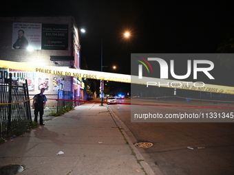 An unidentified male is being wounded after being shot while standing on the street in Chicago, Illinois, United States, on June 14, 2024. A...