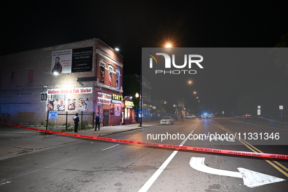 An unidentified male is being wounded after being shot while standing on the street in Chicago, Illinois, United States, on June 14, 2024. A...