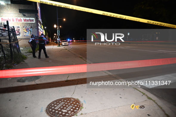 An unidentified male is being wounded after being shot while standing on the street in Chicago, Illinois, United States, on June 14, 2024. A...