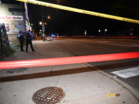 An unidentified male is being wounded after being shot while standing on the street in Chicago, Illinois, United States, on June 14, 2024. A...