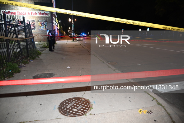 An unidentified male is being wounded after being shot while standing on the street in Chicago, Illinois, United States, on June 14, 2024. A...