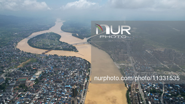 The water level in the Rongan county section of the Pearl River is rising and becoming turbid after a rainstorm in Liuzhou, China, on June 1...