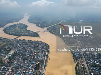 The water level in the Rongan county section of the Pearl River is rising and becoming turbid after a rainstorm in Liuzhou, China, on June 1...