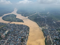 The water level in the Rongan county section of the Pearl River is rising and becoming turbid after a rainstorm in Liuzhou, China, on June 1...