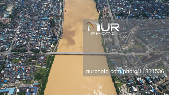 The water level in the Rongan county section of the Pearl River is rising and becoming turbid after a rainstorm in Liuzhou, China, on June 1...