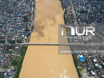 The water level in the Rongan county section of the Pearl River is rising and becoming turbid after a rainstorm in Liuzhou, China, on June 1...