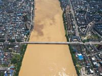 The water level in the Rongan county section of the Pearl River is rising and becoming turbid after a rainstorm in Liuzhou, China, on June 1...