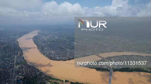 The water level in the Rongan county section of the Pearl River is rising and becoming turbid after a rainstorm in Liuzhou, China, on June 1...